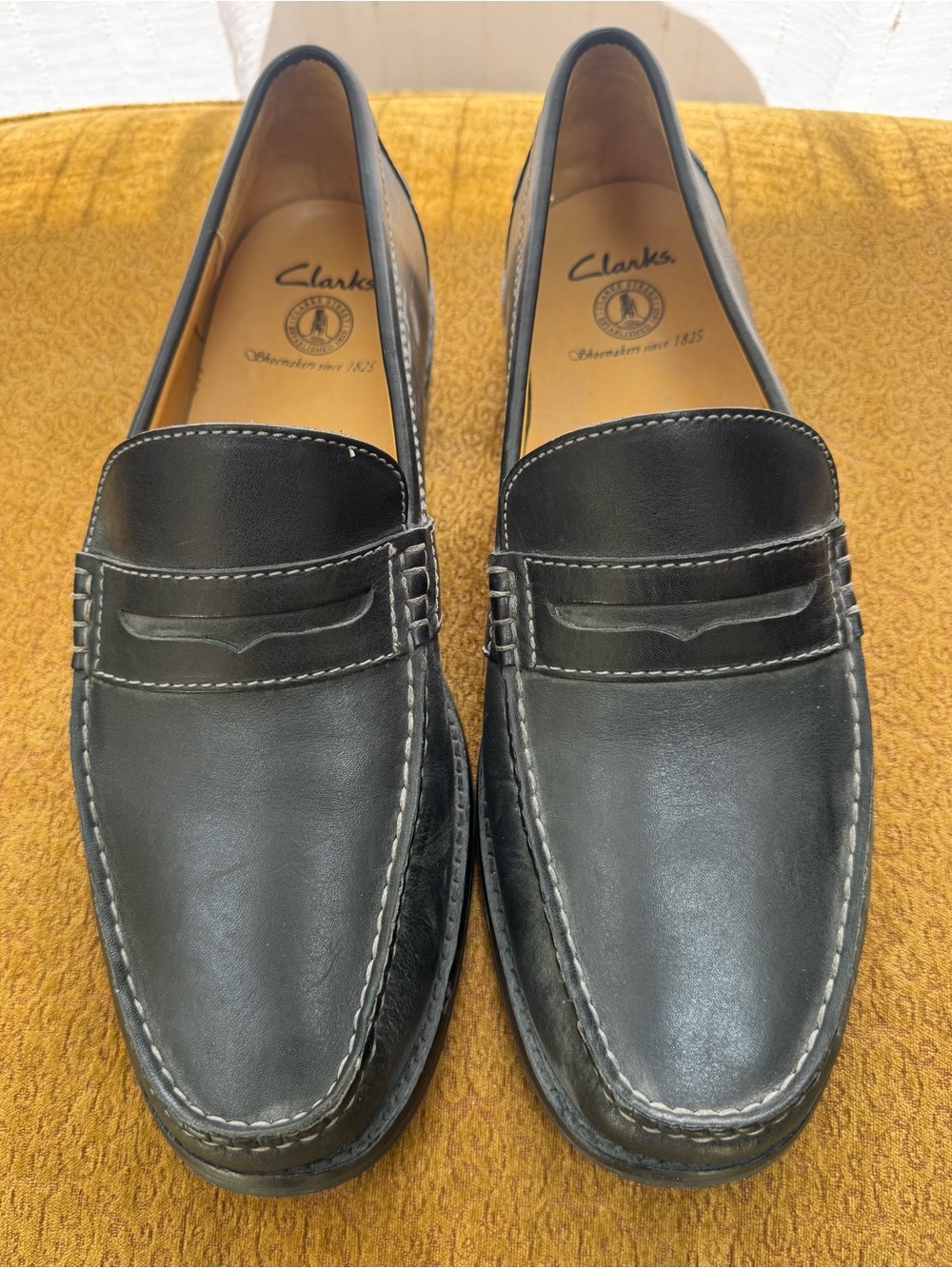 Clarks Black Leather Penny Loafers with Contrast Stitching